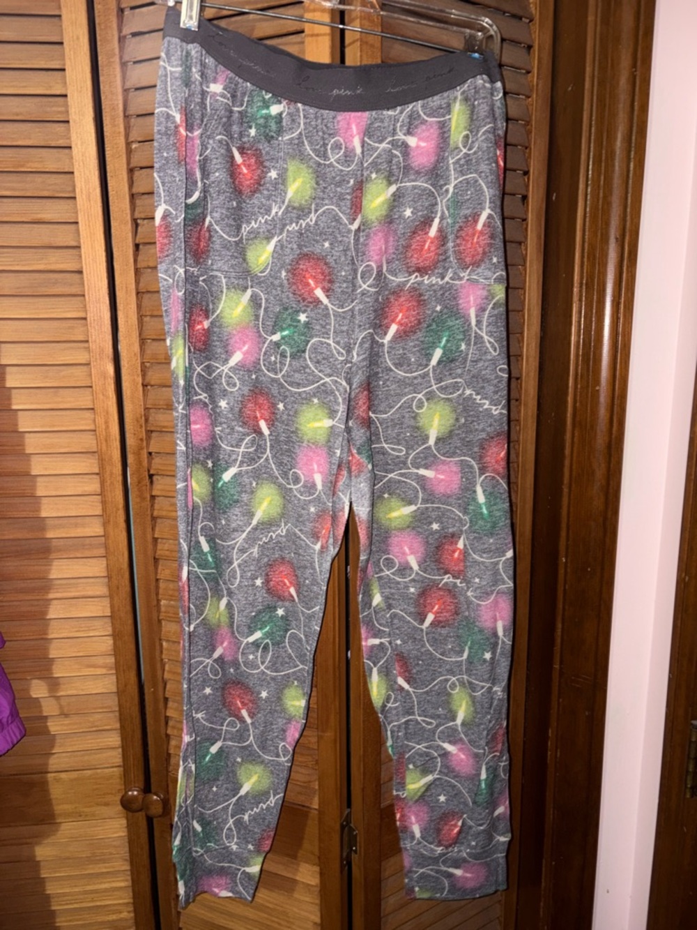 PINK Christmas lights pajama bottoms.